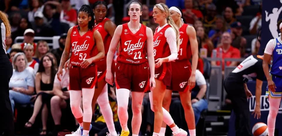 Indy team players on court during basketball game