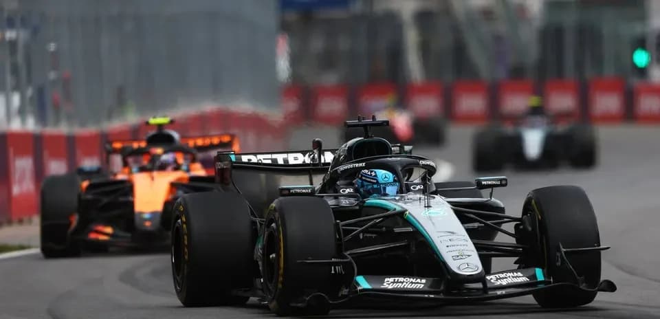 Formula 1 cars racing on street circuit