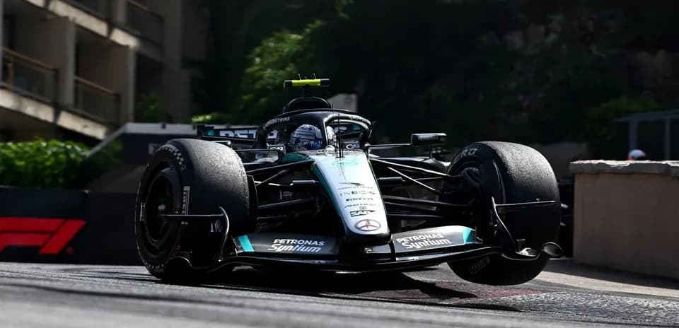 Formula 1 car racing around a corner