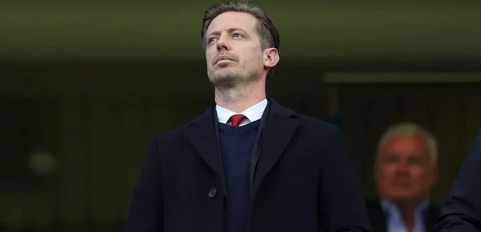 Person observing from the stands at a match