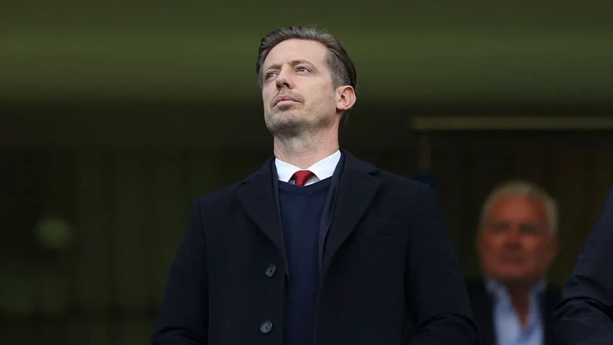 Person observing from the stands at a match