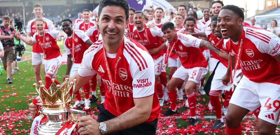 Arsenal players celebrating Premier League title victory
