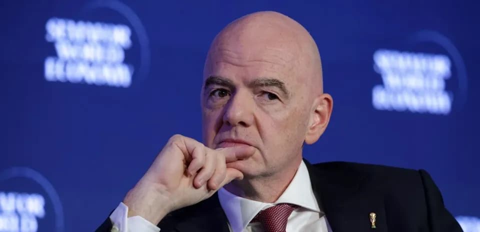 Man with bald head during conference event