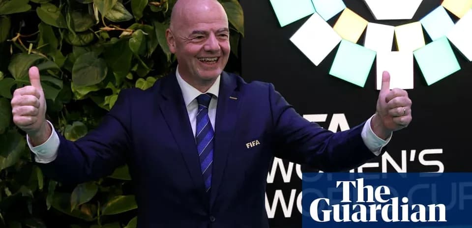 FIFA president giving thumbs up at event