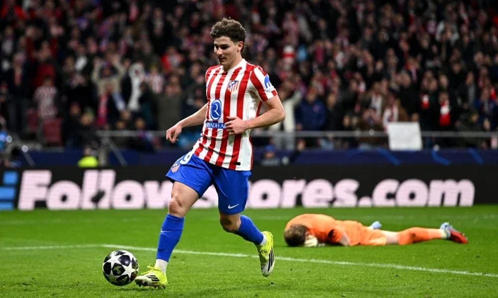 Atletico Madrid player celebrating after scoring goal