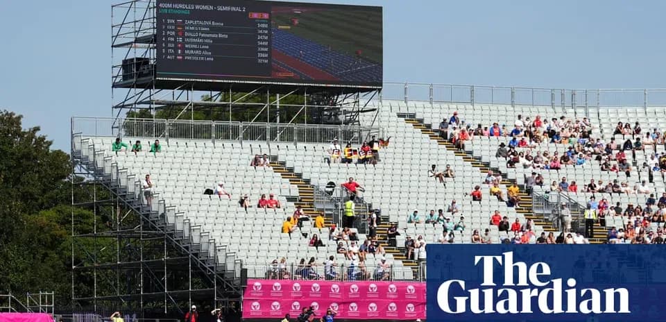 Stadium seating with scoreboard during athletic event