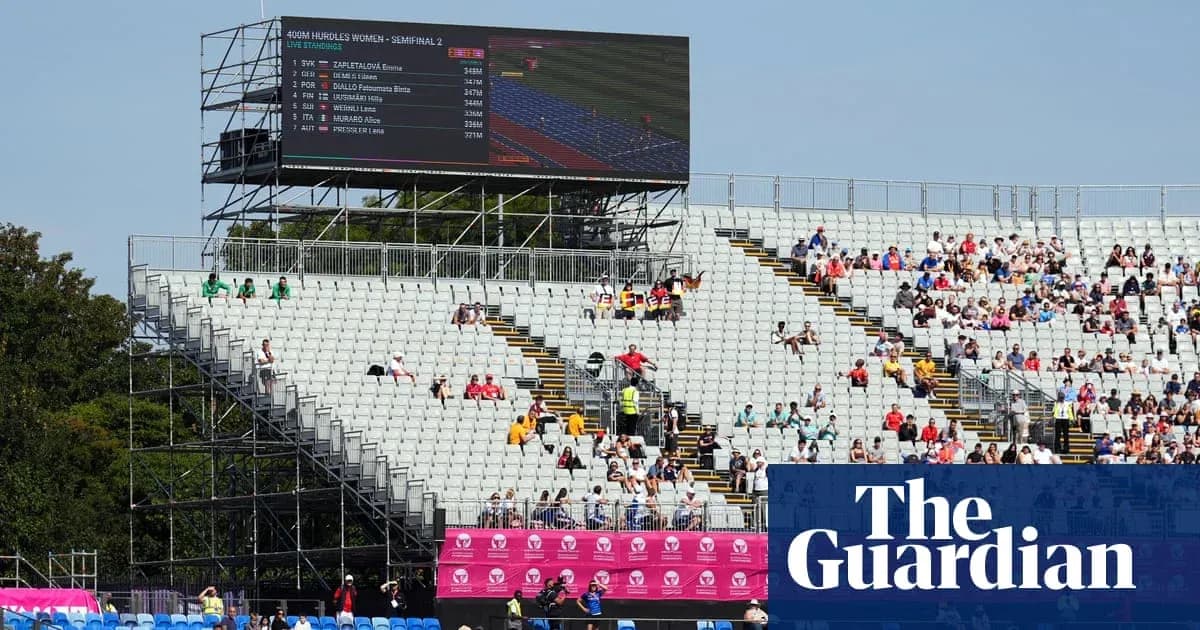 Stadium seating with scoreboard during athletic event