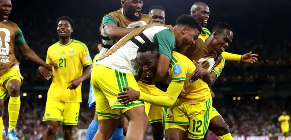 South African players celebrating a goal together