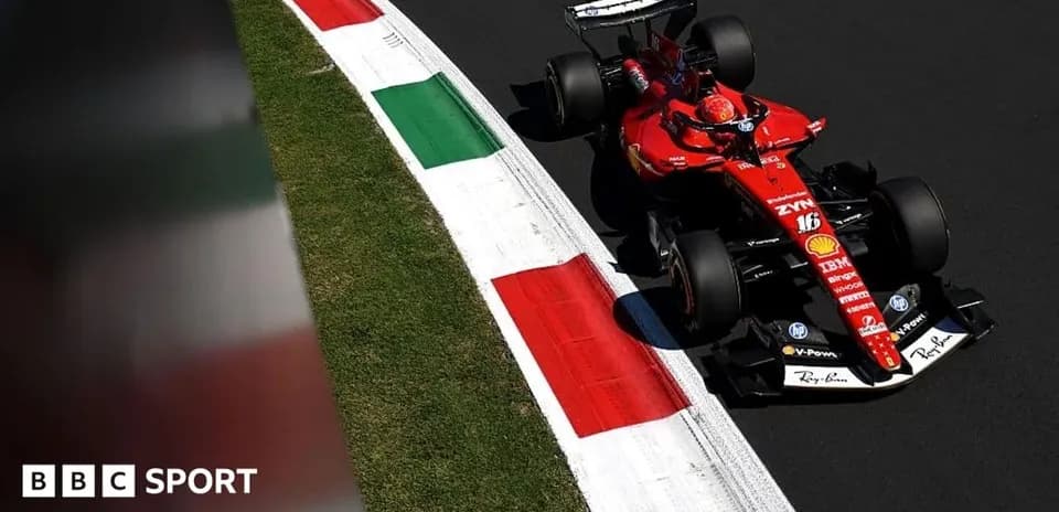 Formula 1 car navigating a corner on racetrack