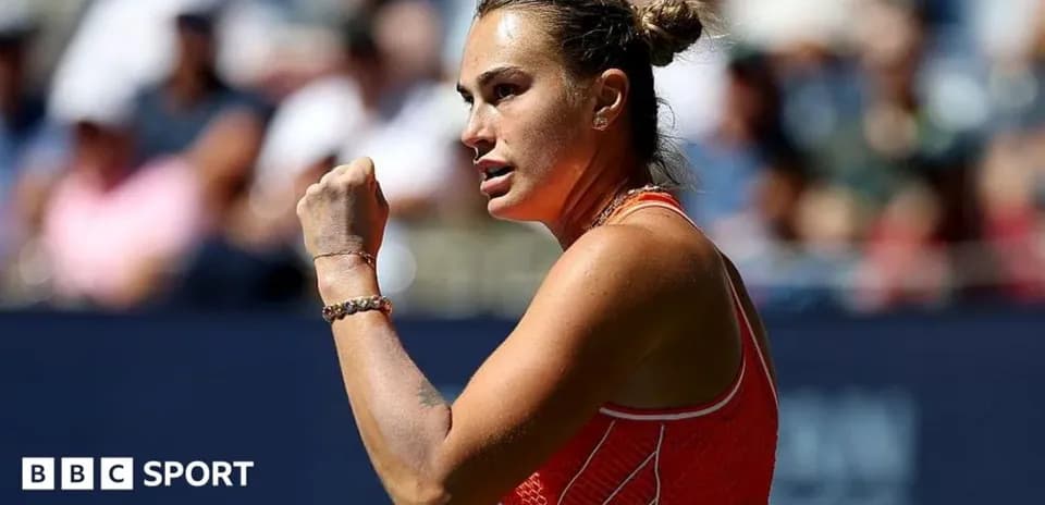 Tennis player celebrating with a raised fist