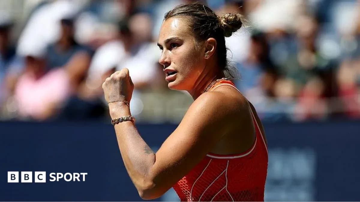 Tennis player celebrating with a raised fist
