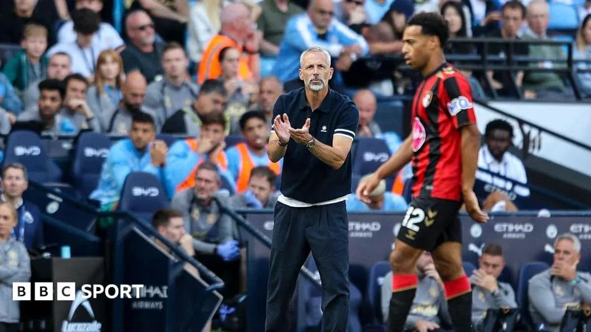 Bournemouth coach directing player during match at stadium