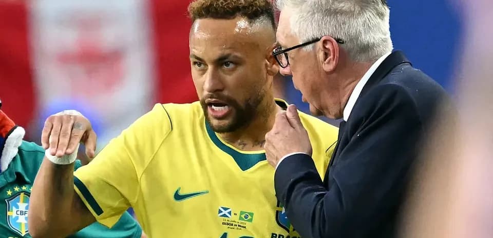 Neymar discussing strategy with coach during match
