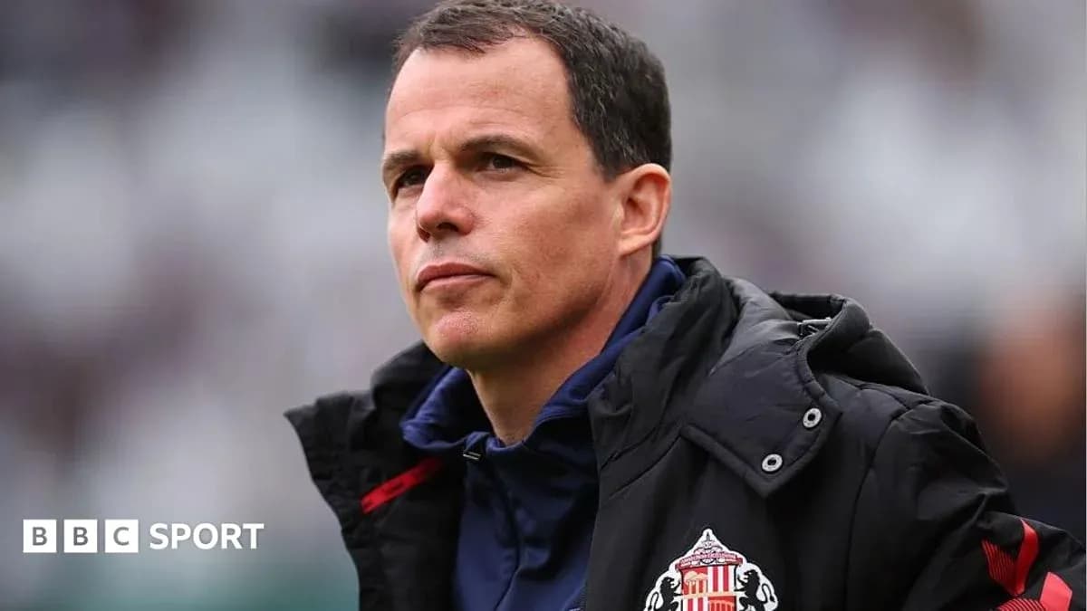 Sunderland manager observing from the sidelines