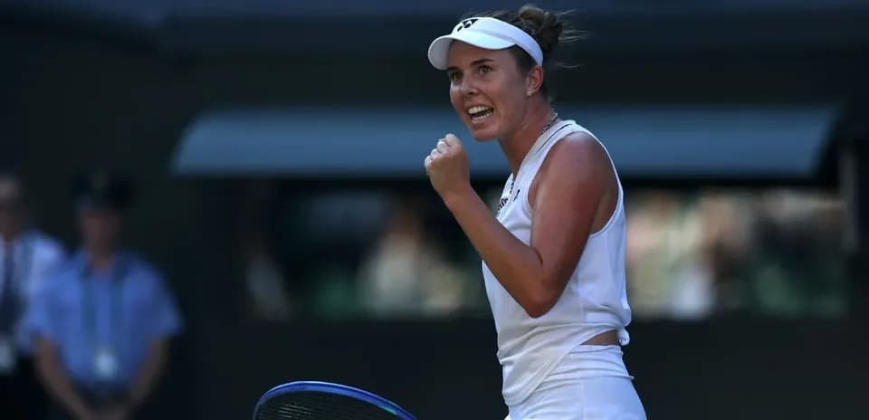 Tennis player celebrating during a match at Wimbledon