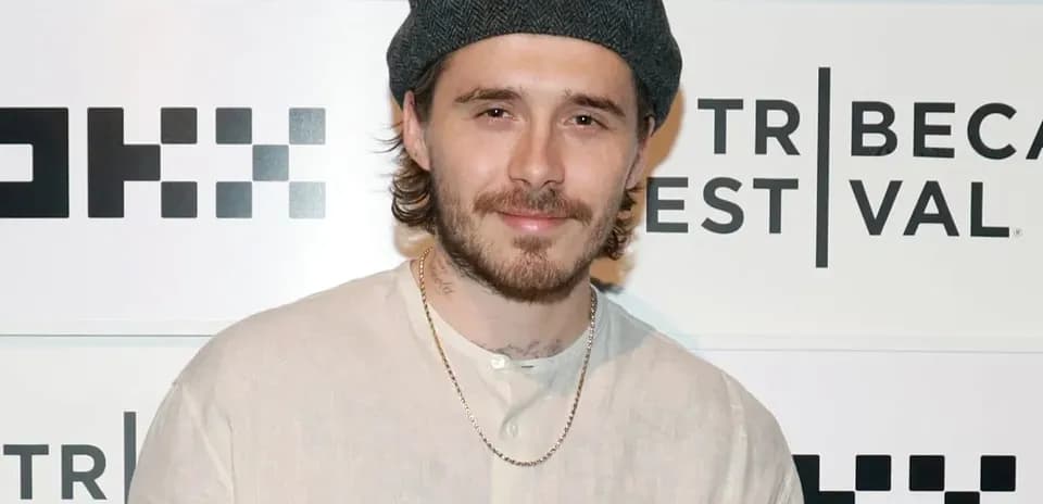 Man wearing a beret at Tribeca Festival event