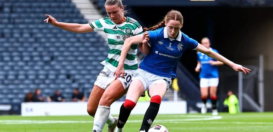 Celtic and Rangers players contesting for the ball