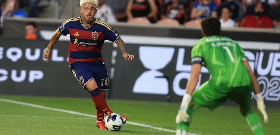 Player dribbling towards goal during match action