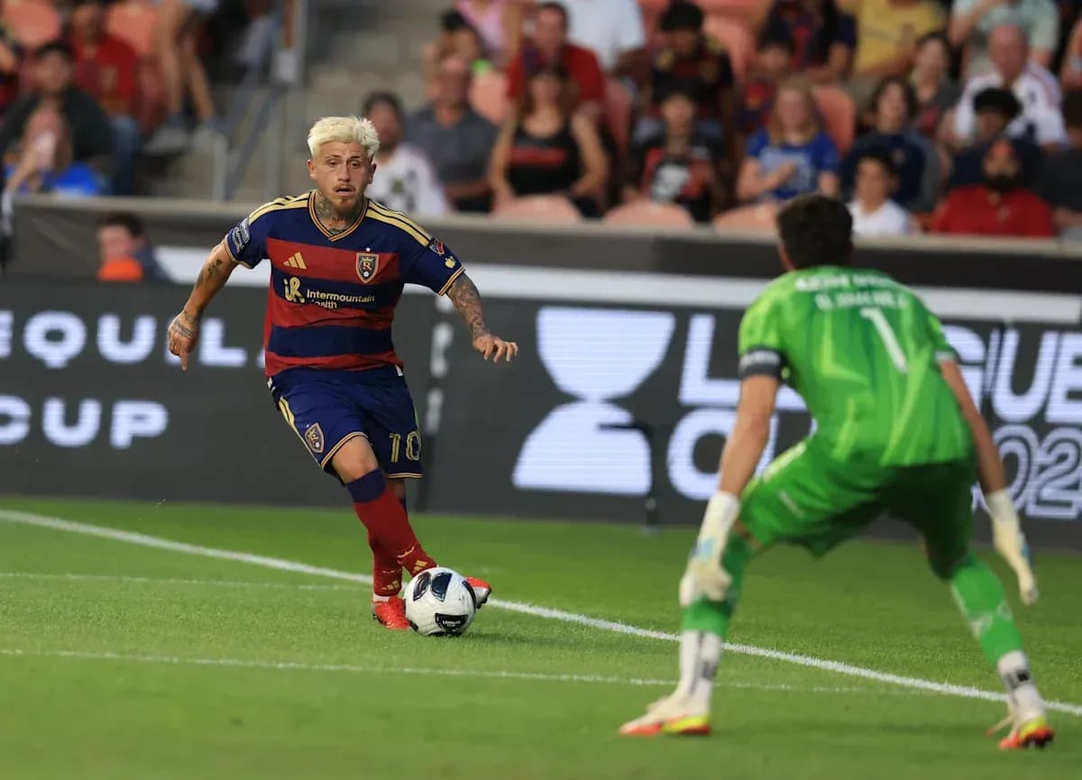 Player dribbling towards goal during match action
