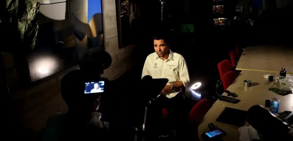 Interviewer speaking during a recorded interview session
