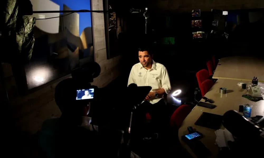 Interviewer speaking during a recorded interview session