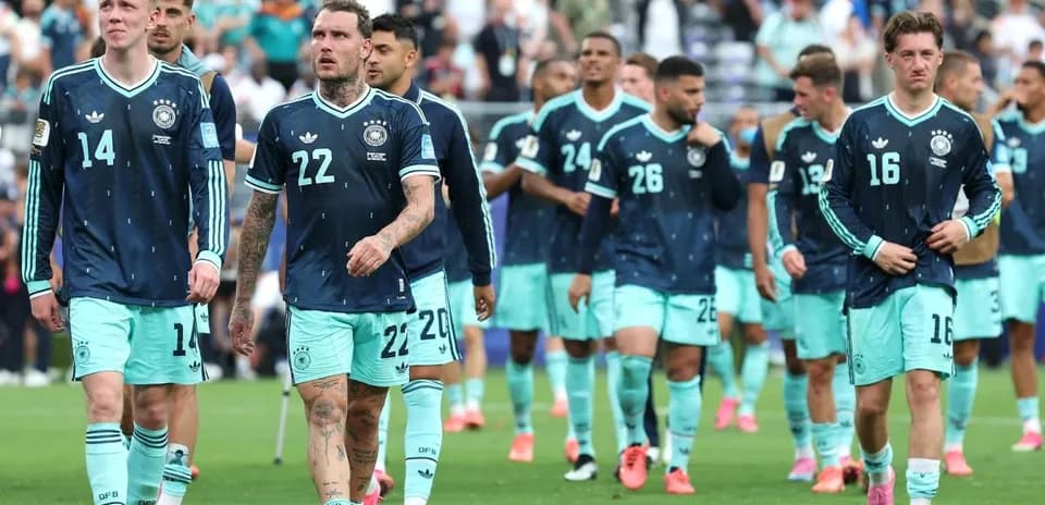Germany team walking off the pitch after match
