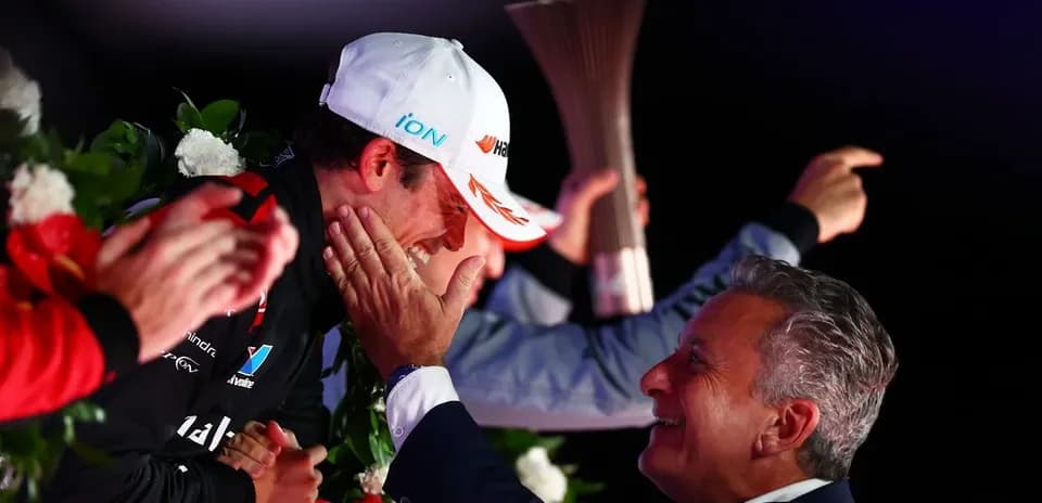 Podium celebration with driver and team principal