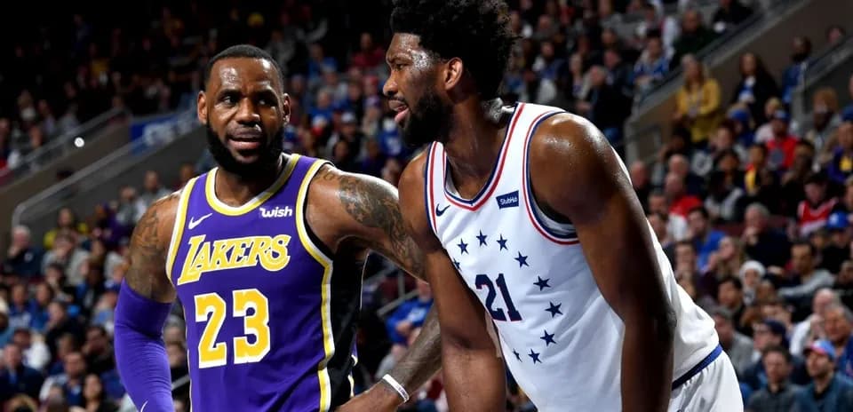 LeBron James and Joel Embiid during basketball game