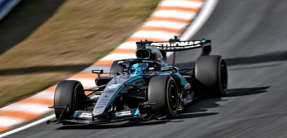 Formula 1 car navigating a curved track