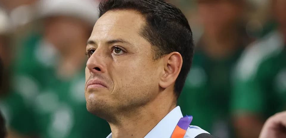 Man with tears watching an event in stadium
