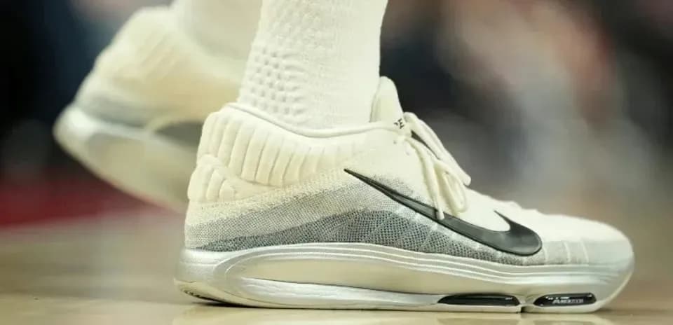 Close-up of basketball shoes on court floor