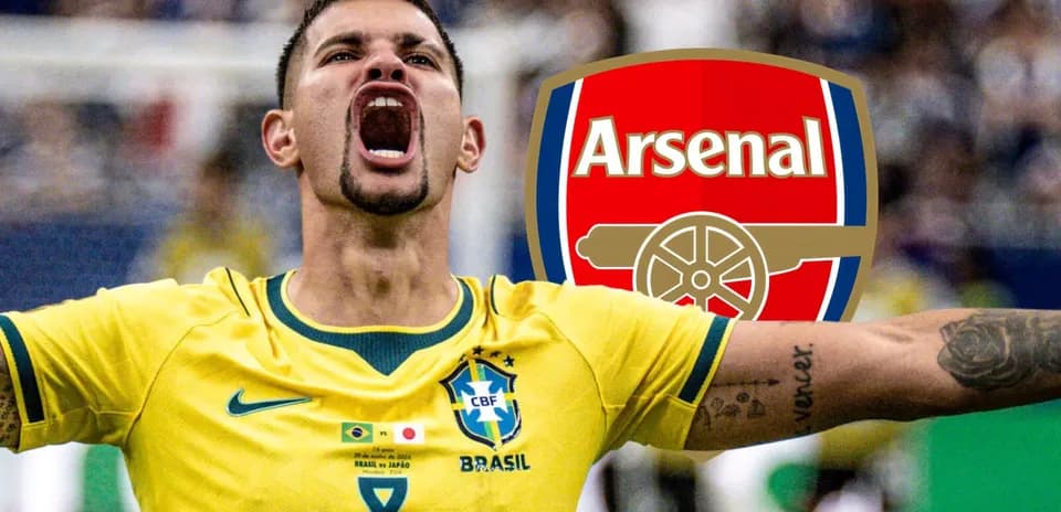 Brazillian player celebrating with Arsenal logo background