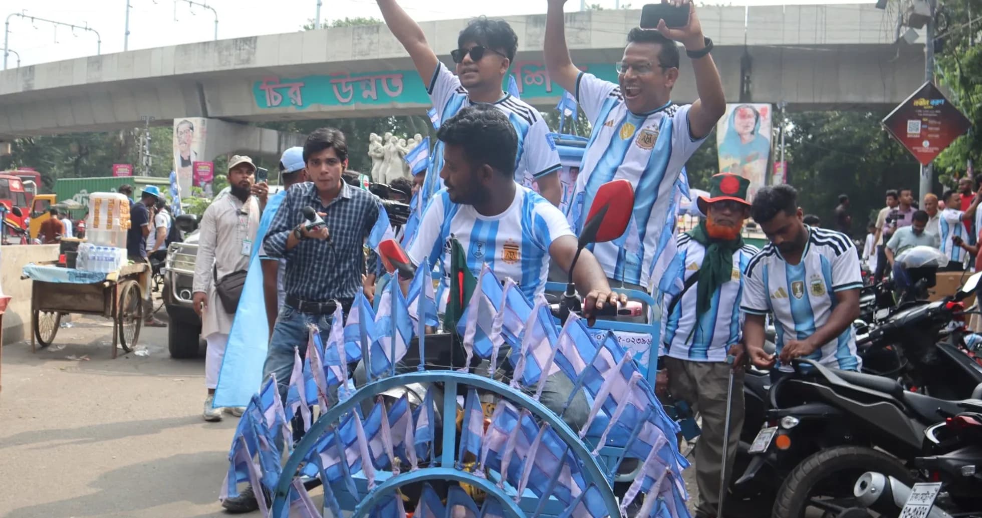 Fans celebrating with flags during a parade