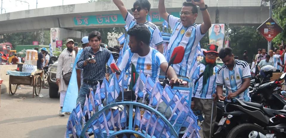 Fans celebrating with flags during a parade