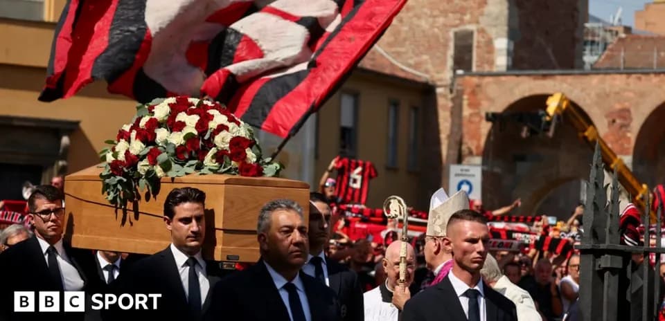 Mourners carrying a coffin during a funeral procession