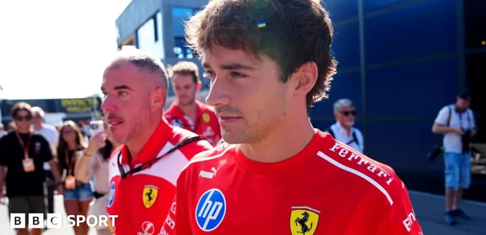 Formula 1 drivers walking in Ferrari team attire