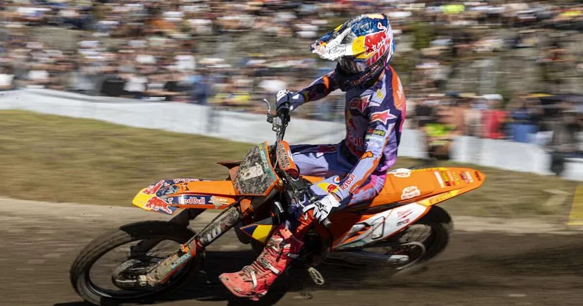 Motocross rider racing on a dirt track