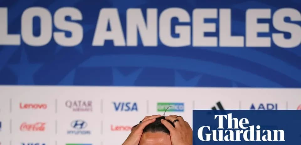 Men's football coach at press conference in Los Angeles