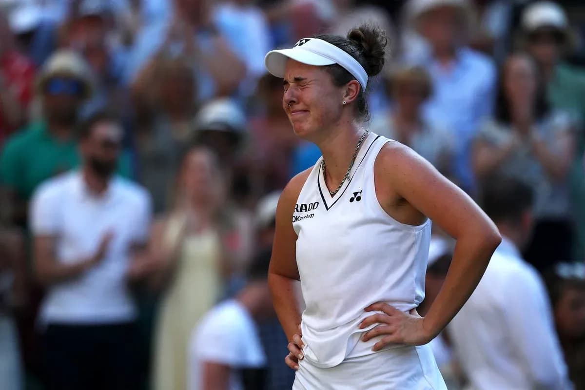 Tennis player reacting during a match at Wimbledon