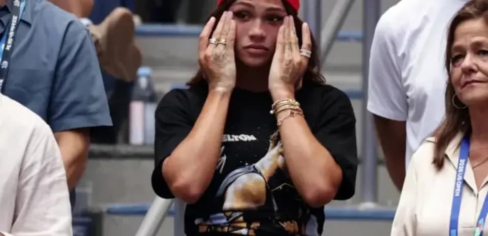 Spectators watching tense moment at sports event