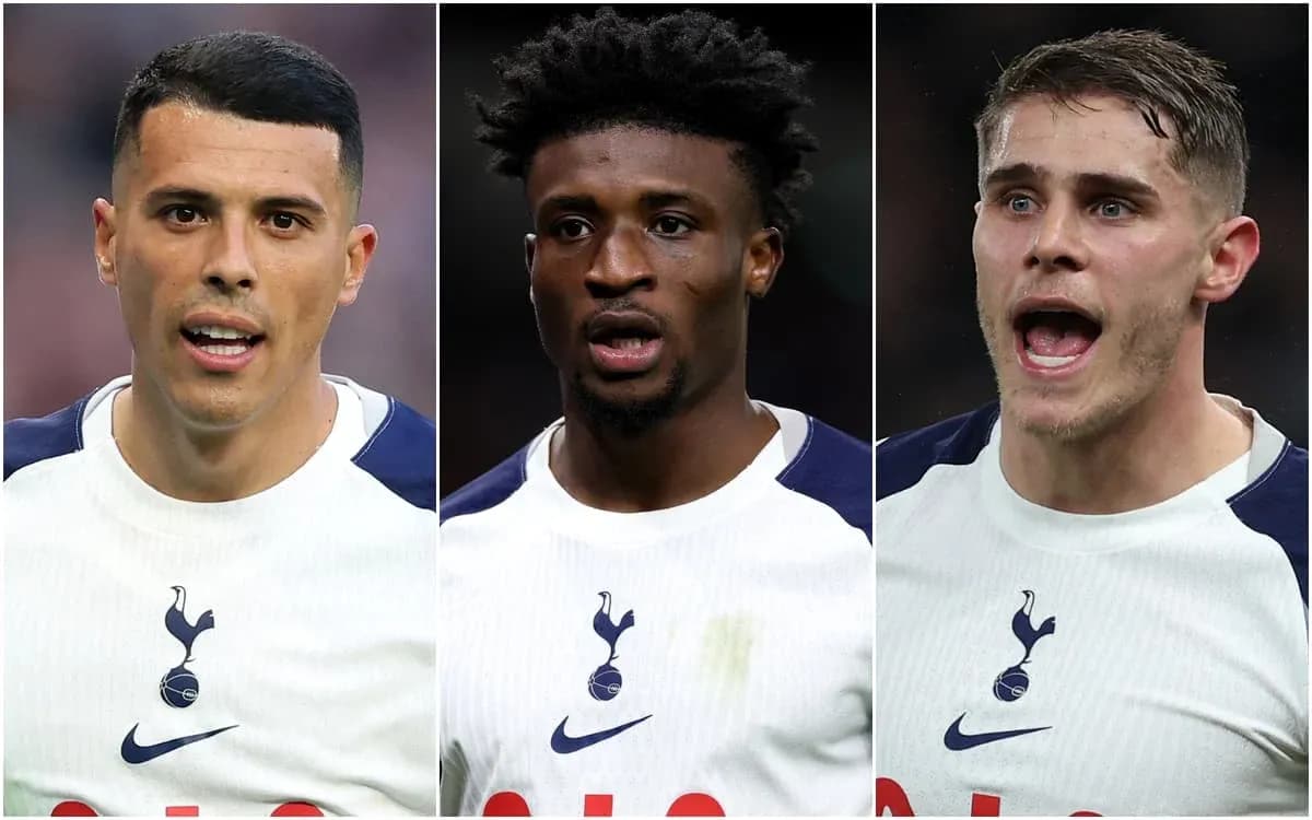 Three Tottenham players in team kits during match