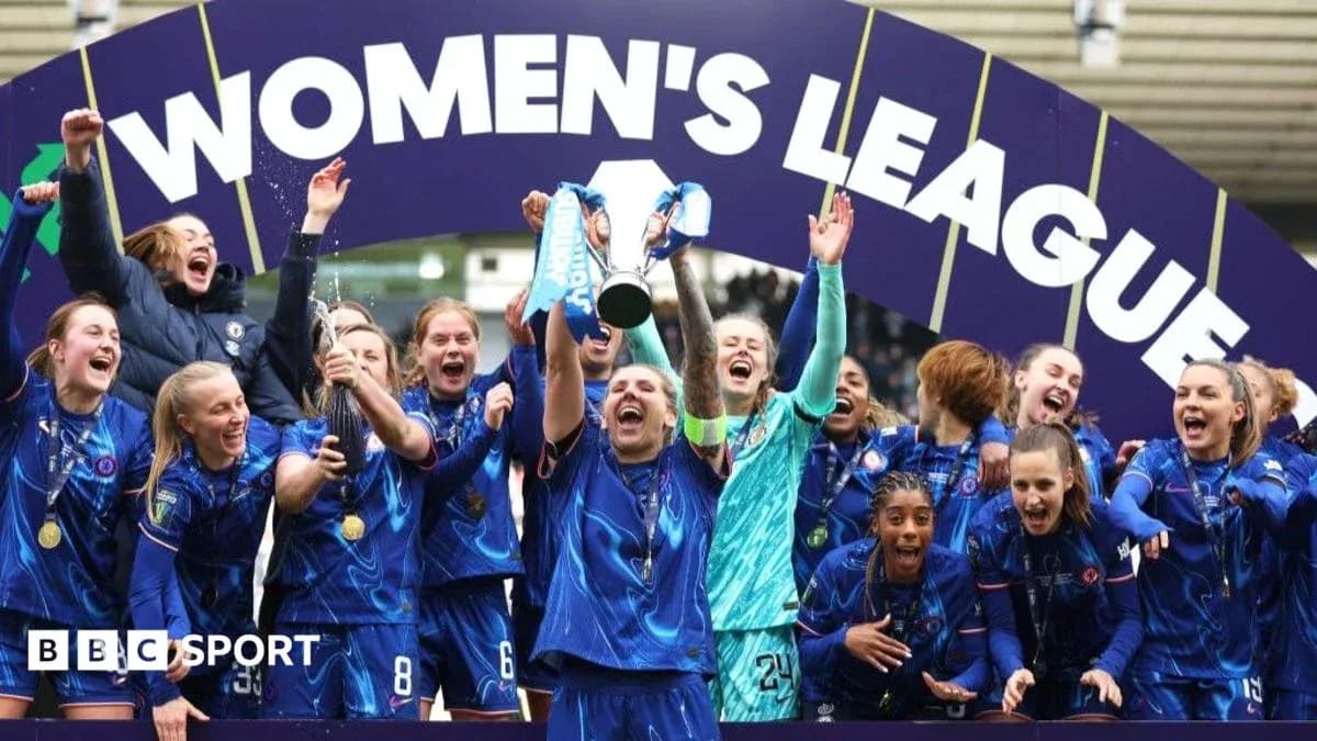 Chelsea Women's team celebrating league victory with trophy