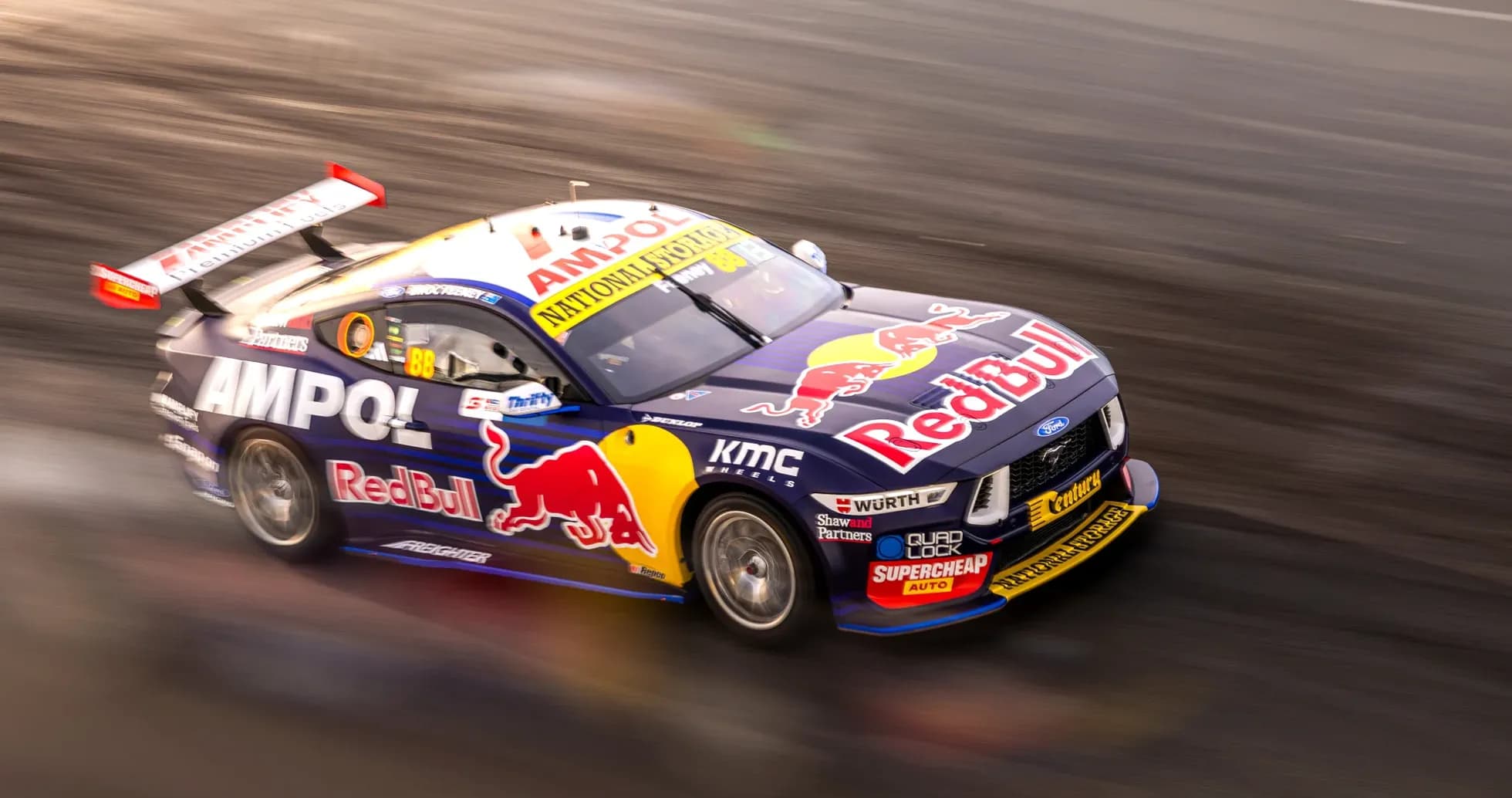 Race car speeding on track during competition