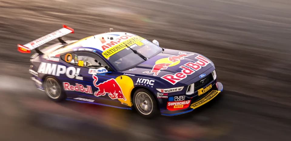 Race car speeding on track during competition