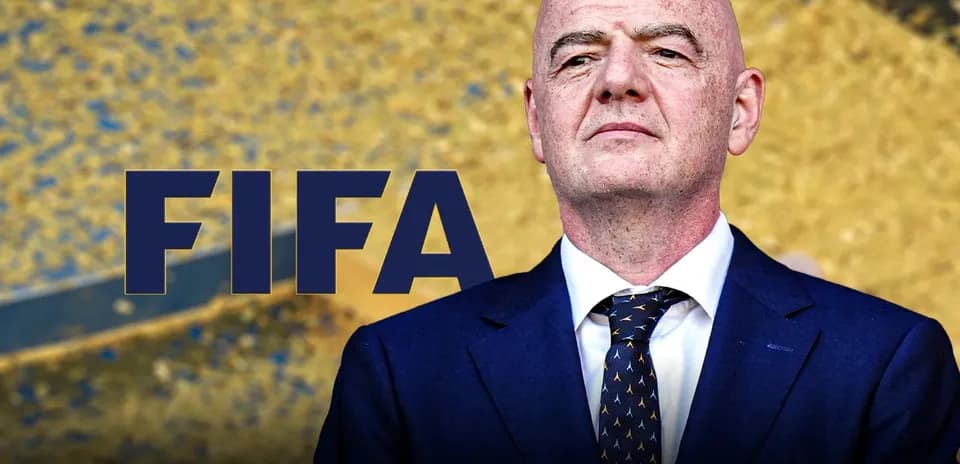 FIFA logo with official at press event