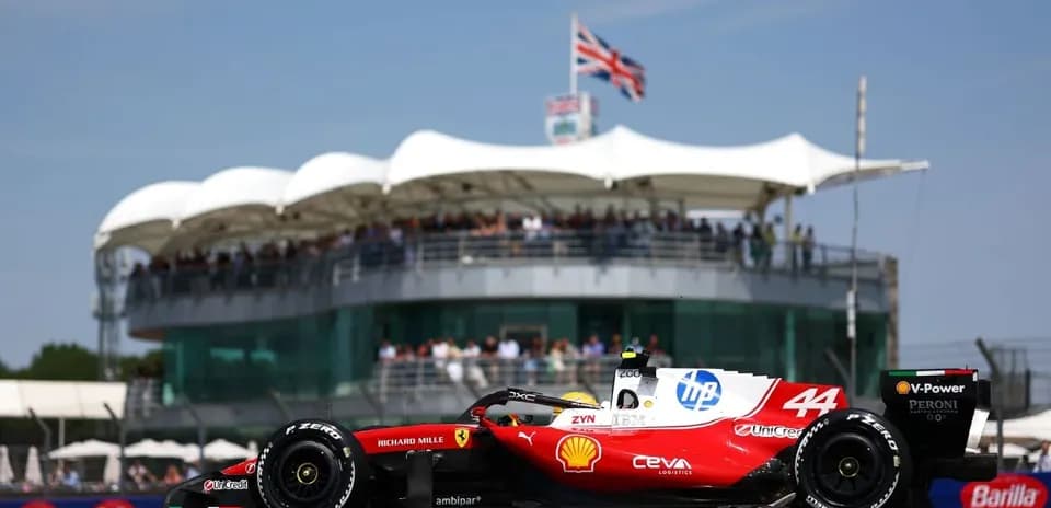 Formula 1 car racing near grandstand during event