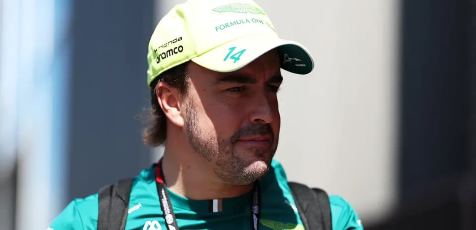 Formula 1 driver wearing Aston Martin cap