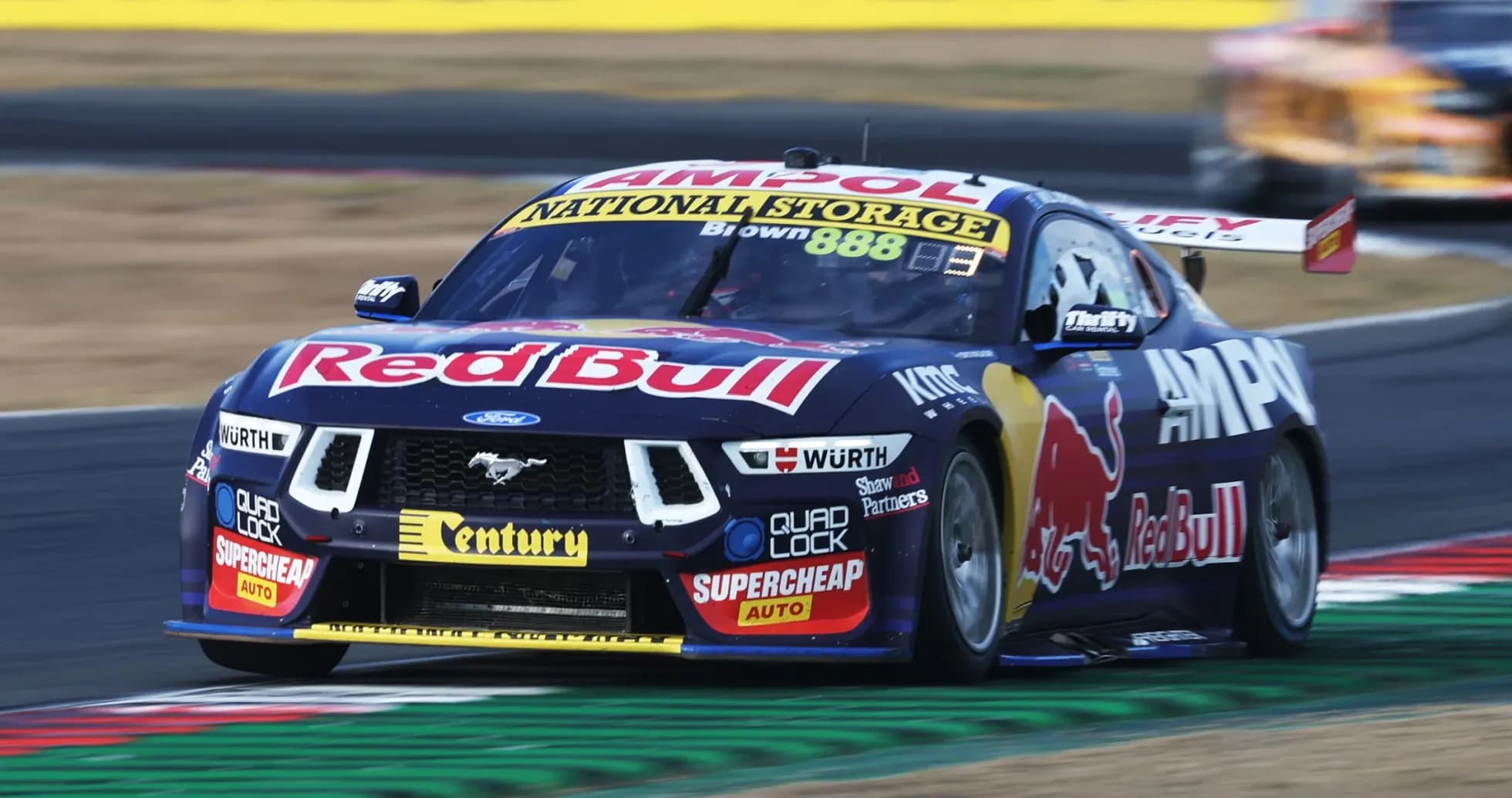 Red Bull Ford Mustang racing on track