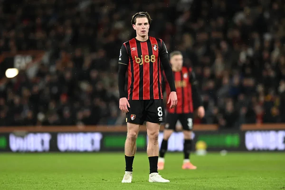 Bournemouth player standing on field during match