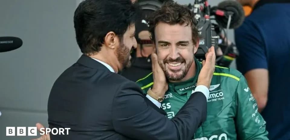 Fernando Alonso smiling during post-race celebration